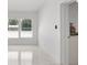 Bright living room with marble floors, natural light, neutral tones, and recessed lighting at 5255 Seminole Ave, Winter Park, FL 32792