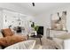 Bright living room featuring a fireplace, modern decor, and an open floor plan at 5255 Seminole Ave, Winter Park, FL 32792