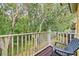 Cozy balcony overlooking lush greenery, providing a peaceful retreat to enjoy nature's beauty at 8443 Crystal Cove Loop, Kissimmee, FL 34747