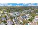 Aerial view of the neighborhood, highlighting the homes among mature trees and green spaces at 1131 Fern Ave, Orlando, FL 32814