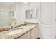 Bathroom vanity features granite countertops and double sinks at 1131 Fern Ave, Orlando, FL 32814