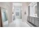 Bathroom featuring double vanity, large mirror, and walk-in shower at 1131 Fern Ave, Orlando, FL 32814