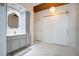 Stylish bathroom showcasing a vanity with gray cabinets, an ornate mirror, and modern lighting fixtures at 1131 Fern Ave, Orlando, FL 32814