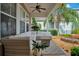Covered patio with cushioned seating area and view of a spa at 1131 Fern Ave, Orlando, FL 32814