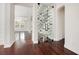 View of wine cellar from living room with hardwood floors and modern lighting at 1131 Fern Ave, Orlando, FL 32814