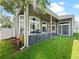 Outdoor kitchen, grilling station, and expansive grassy backyard at 1424 Richmond Grand Ave, Orlando, FL 32820