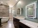 Modern bathroom with double vanity and large LED mirror at 1424 Richmond Grand Ave, Orlando, FL 32820