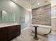 Spa-like bathroom with soaking tub and walk-in shower at 1424 Richmond Grand Ave, Orlando, FL 32820