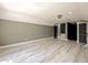 Spacious bonus room with wood-look floors and high ceilings at 1424 Richmond Grand Ave, Orlando, FL 32820