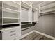Large walk-in closet with ample shelving and hanging space at 1424 Richmond Grand Ave, Orlando, FL 32820