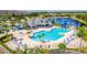 Resort-style pool with water slide, lap lanes, and a large deck with lounge chairs at 1424 Richmond Grand Ave, Orlando, FL 32820