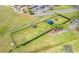 Fenced dog park with shaded seating area at 1424 Richmond Grand Ave, Orlando, FL 32820