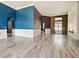 Living room with hardwood floors, fireplace and two-toned walls at 1424 Richmond Grand Ave, Orlando, FL 32820