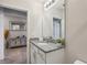 Bathroom with granite countertop and a shower/tub combo at 1656 Aspen Ave, Davenport, FL 33837