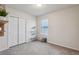 Bedroom with window, closet, and shelving at 1656 Aspen Ave, Davenport, FL 33837