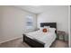 Comfortable bedroom with plush carpet and neutral decor at 1656 Aspen Ave, Davenport, FL 33837