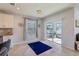 Bright dining area with sliding glass doors to backyard at 1656 Aspen Ave, Davenport, FL 33837