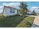 Charming home with a well-manicured front lawn and inviting curb appeal at 1656 Aspen Ave, Davenport, FL 33837