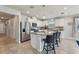 Kitchen with island, stainless steel appliances, and granite countertops at 1656 Aspen Ave, Davenport, FL 33837