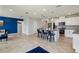 Open kitchen with island and stainless steel appliances at 1656 Aspen Ave, Davenport, FL 33837