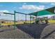 Playground with swings and play structures at 1656 Aspen Ave, Davenport, FL 33837