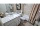 Clean bathroom with a tub shower combo and white vanity at 1724 Silver Creek Ct # 105, Orlando, FL 32807
