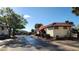 Community entrance with gated access, landscaping, and building at 1724 Silver Creek Ct # 105, Orlando, FL 32807