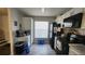 Well-equipped kitchen, white cabinets, black appliances at 1724 Silver Creek Ct # 105, Orlando, FL 32807
