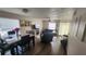 Living room with leather furniture, fireplace, and dining area at 1724 Silver Creek Ct # 105, Orlando, FL 32807