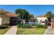 Community pool with lounge chairs and gated access at 1724 Silver Creek Ct # 105, Orlando, FL 32807