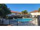 Community pool with plenty of lounge chairs at 1724 Silver Creek Ct # 105, Orlando, FL 32807