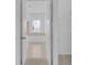 Elegant bathroom with a soaking tub, neutral tile, and natural light from a window at 3929 Corrine Dr, Orlando, FL 32814
