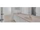 Bathroom with double sink vanity, mirror, and walk in shower, creating a spa-like feel at 3929 Corrine Dr, Orlando, FL 32814