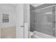 Bathroom featuring a clear glass shower door and tile flooring for a clean, modern look at 3929 Corrine Dr, Orlando, FL 32814