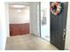 Bright entryway with hardwood floors and access to the living room at 3929 Corrine Dr, Orlando, FL 32814