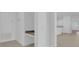 Bright entryway featuring built-in desk, closet, and neutral tile flooring at 3929 Corrine Dr, Orlando, FL 32814