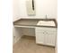Simple laundry room with sink and cabinets at 3929 Corrine Dr, Orlando, FL 32814