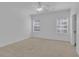 Bright, spacious main bedroom with ample natural light and neutral carpet, creating a serene atmosphere at 3929 Corrine Dr, Orlando, FL 32814