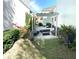Private patio with pergola and seating area at 3929 Corrine Dr, Orlando, FL 32814