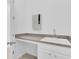Utility sink area with countertop space and cabinet storage in a well-lit area at 3929 Corrine Dr, Orlando, FL 32814