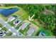 Aerial view of a home showcasing its location within a community, with a spacious backyard ready for outdoor enjoyment at 4223 Sunset Preserve Blvd, Orlando, FL 32820