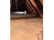 Spacious attic featuring exposed rafters, insulation and a plywood floor at 5138 Andrea Blvd, Orlando, FL 32807