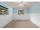 Bedroom featuring ceiling fan, neutral paint, and a window at 5138 Andrea Blvd, Orlando, FL 32807