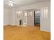Bright bedroom featuring ceiling fan, closet, view to bathroom, and neutral paint at 5138 Andrea Blvd, Orlando, FL 32807