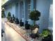 House exterior shows a side view of the well-kept yard and landscaping features at 5138 Andrea Blvd, Orlando, FL 32807