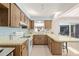 Classic kitchen design with wooden cabinets and appliances at 5138 Andrea Blvd, Orlando, FL 32807