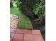 Beautiful landscaping on this home's grounds with pavers, stones and well maintained lawn at 5138 Andrea Blvd, Orlando, FL 32807