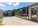 Outdoor screened-in pool area featuring a storage shed and a patio at 5138 Andrea Blvd, Orlando, FL 32807