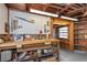 Well-lit pool equipment room with lots of storage and a pegboard for easy tool access at 5138 Andrea Blvd, Orlando, FL 32807