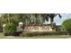 North Bay community entrance with stone and landscaping at 9130 Dollanger Ct, Orlando, FL 32819